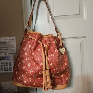 Dooney & Bourke Salmon Canvas Crossword Bucket Bag
